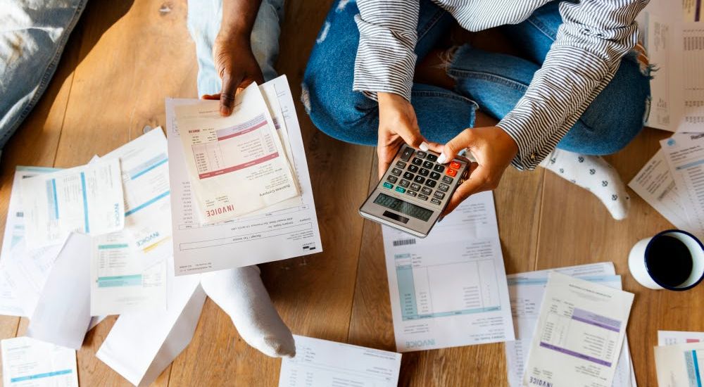 people budget planning with calculator